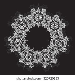 Design element.Endless ornamental ethnic texture.Template for decoration.Hand-draw vector illustration.Ornament of white elements on a black background.