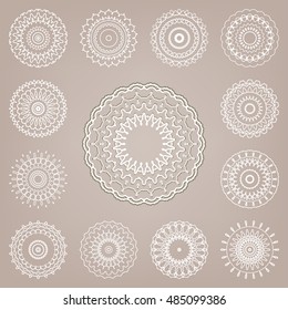 Design elements set of different round mandala ornaments, logo icon label, business symbols collection. Stylized flowers, stars or snowflakes. Abstract geometric shape, tribal ethnic circular patterns