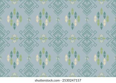 The design features diamond shapes and other angular elements in shades of green and off-white. The pattern has a pixelated, woven or embroidered appearance