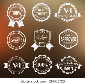 Design of labels, emblems and logos with the  mark on a blurred background. The best premium quality. Vector illustration. Set.