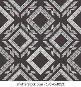 Design with manual hatching. Ethnic boho ornament. Seamless pattern. Tribal motif. Vector illustration for web design or print.