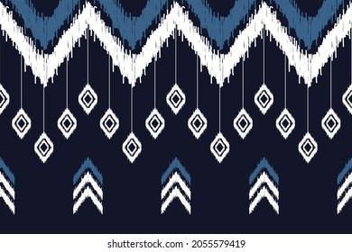 Design of Native Textile with Blue background and White Bohemian Geometric ikat pattern for fabric pattern, Embroidery, wallpaper, Decoration.