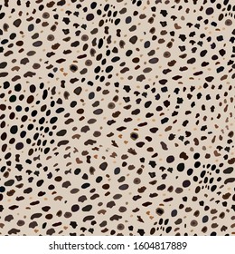 The design pattern of the skin of a Cheetah. Cheetah spots print vector background illustration. Fur leather illustration for printing