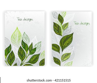 Design with patterned, green and gray leaves of tea on textural background.