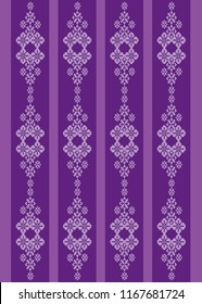 ‘Songket’ design purple colour with flowery motif design element. A Malay traditional embroidery fabric.