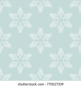 design of seamless pattern with white snowflakes on blue background