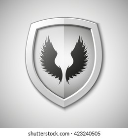 Design Shield with wings inside. Origami vector banner