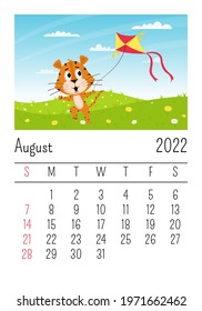 Design template for the calendar for 2022, August. Cute cartoon tiger runs with a kite in the field. Summer landscape. The symbol of the year. Animal character. Color vector illustration for kids.