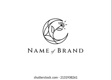 Design template of a moon logo with beautiful flowers in a minimalist bohemian monoline concept in black color.