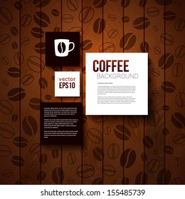 Design template for Your coffee shop. Burnt wooden background with coffee beans. Vector image. 