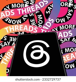 Design white Threads logo on black monitor smartphone put on background text type"THREADS" on ribbon gradient yellow pink and purple, Text type"SAY MORE" on black ribbon.