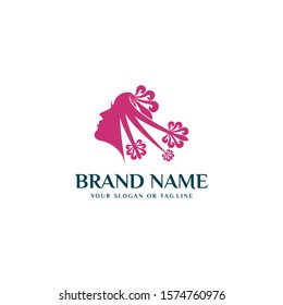 design a woman's face logo with flowers for the beauty business vector template