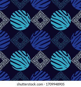 Design with Zebra stripes and Leopard spots. Ethnic boho ornament. Seamless background. Tribal motif. Vector illustration for web design or print.