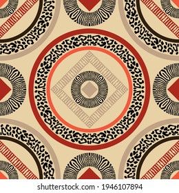 Design with Zebra stripes and Leopard spots. Ethnic boho ornament. Seamless background. Tribal motif. Vector illustration for web design or print.