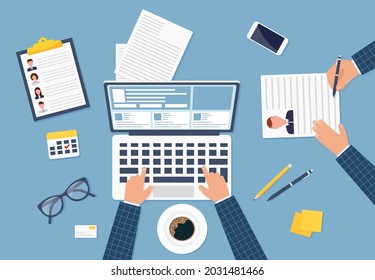 Designed by human resources meeting. Top view of a table, laptop, folder, documents, notepad, business card, books, coffee, business organization Eps 10