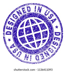 DESIGNED IN USA stamp watermark with grunge texture. Blue vector rubber print of DESIGNED IN USA label with dirty texture. Seal has words arranged by circle and globe symbol.