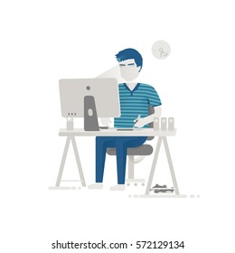 Designer behind a desktop