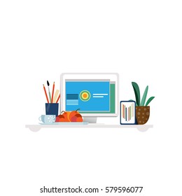 Designer workplace concept with monitor stationery coffee plant mobile and fruits in flat style isolated vector illustration