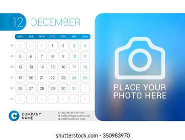 Desk Calendar for 2016 Year. December. Vector Design Print Template with Place for Photo, Logo and Contact Information. Week Starts Monday. Calendar Grid with Week Numbers