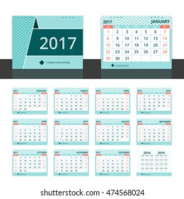 Desk calendar 2017 for corporate business. Set include 12 months, front cover, back cover (2016 and 2018) on green aqua chevron stripe abstract background. Week start on Sunday.