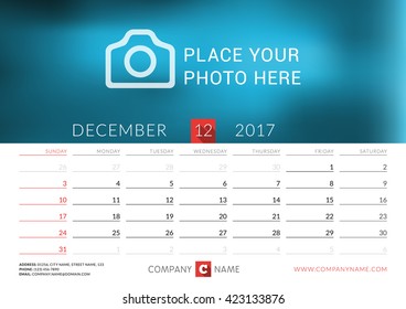 Desk calendar for 2017 year. Vector print template with place for photo. December. Week starts Sunday