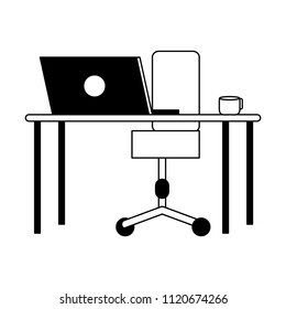 Desk and chair with laptop in black and white