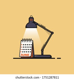 desk lamp is brighten calendar desk on light brown background 