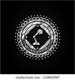 desk lamp icon drawn on a blackboard