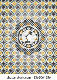 desk lamp icon inside arabesque badge background. arabic decoration.