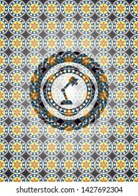 desk lamp icon inside arabesque style emblem. arabic decoration.