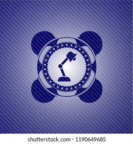 desk lamp icon inside badge with denim texture