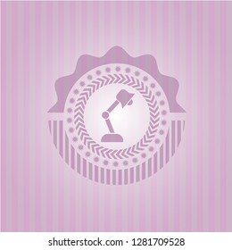 desk lamp icon inside badge with pink background