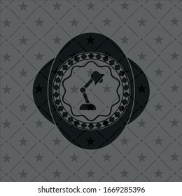 icono de la lámpara de escritorio dentro de la placa negra