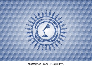 desk lamp icon inside blue hexagon badge.