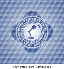 desk lamp icon inside blue hexagon badge.