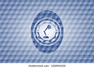 desk lamp icon inside blue emblem with geometric background.