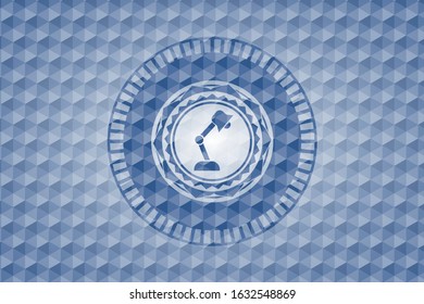 desk lamp icon inside blue hexagon emblem.