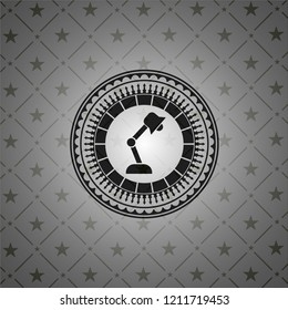 desk lamp icon inside dark emblem. Retro