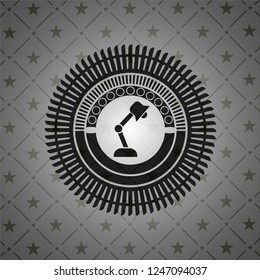 desk lamp icon inside dark badge