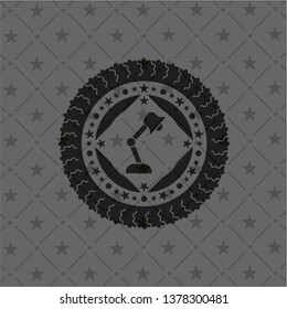 desk lamp icon inside dark emblem. Retro