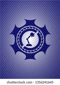 desk lamp icon inside denim background