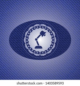desk lamp icon inside emblem with jean texture