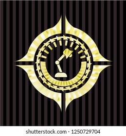 desk lamp icon inside gold shiny emblem