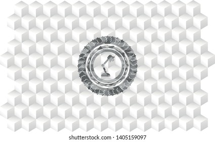 desk lamp icon inside grey emblem. Retro with geometric cube white background