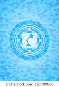 desk lamp icon inside light blue mosaic emblem