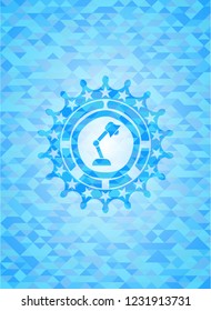 desk lamp icon inside light blue emblem with triangle mosaic background