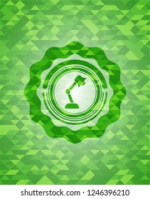 desk lamp icon inside realistic green mosaic emblem