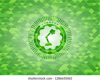 desk lamp icon inside realistic green mosaic emblem