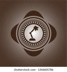 desk lamp icon inside realistic wood emblem