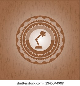 desk lamp icon inside realistic wooden emblem